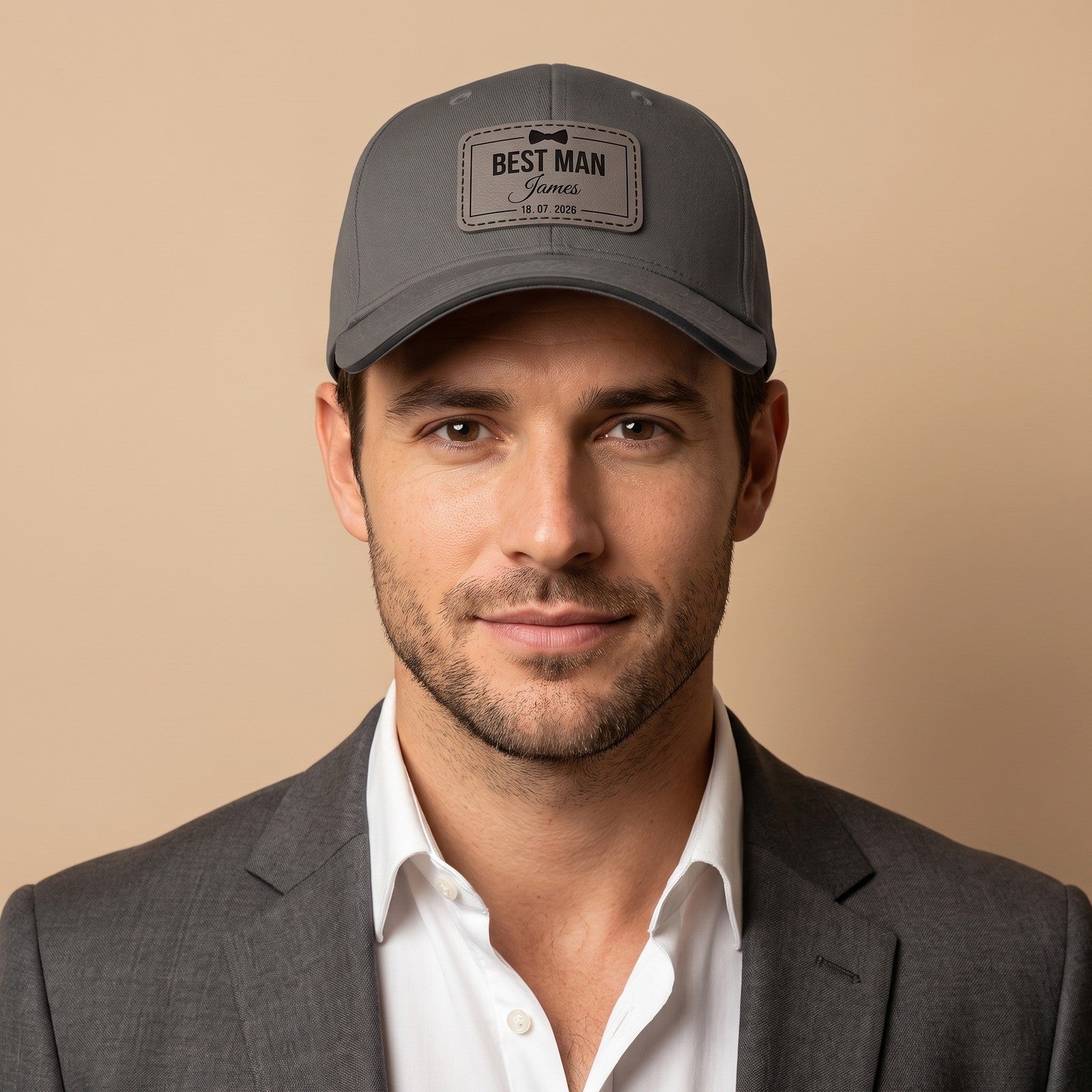 Man wearing the graphite grey custom leather patch baseball cap