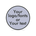 Custom embroidered patch displaying customizable text for logo or name on a light blue background.