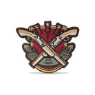 Embroidered custom patch featuring crossed guns on a decorative background, showcasing vivid thread colors and intricate detail.