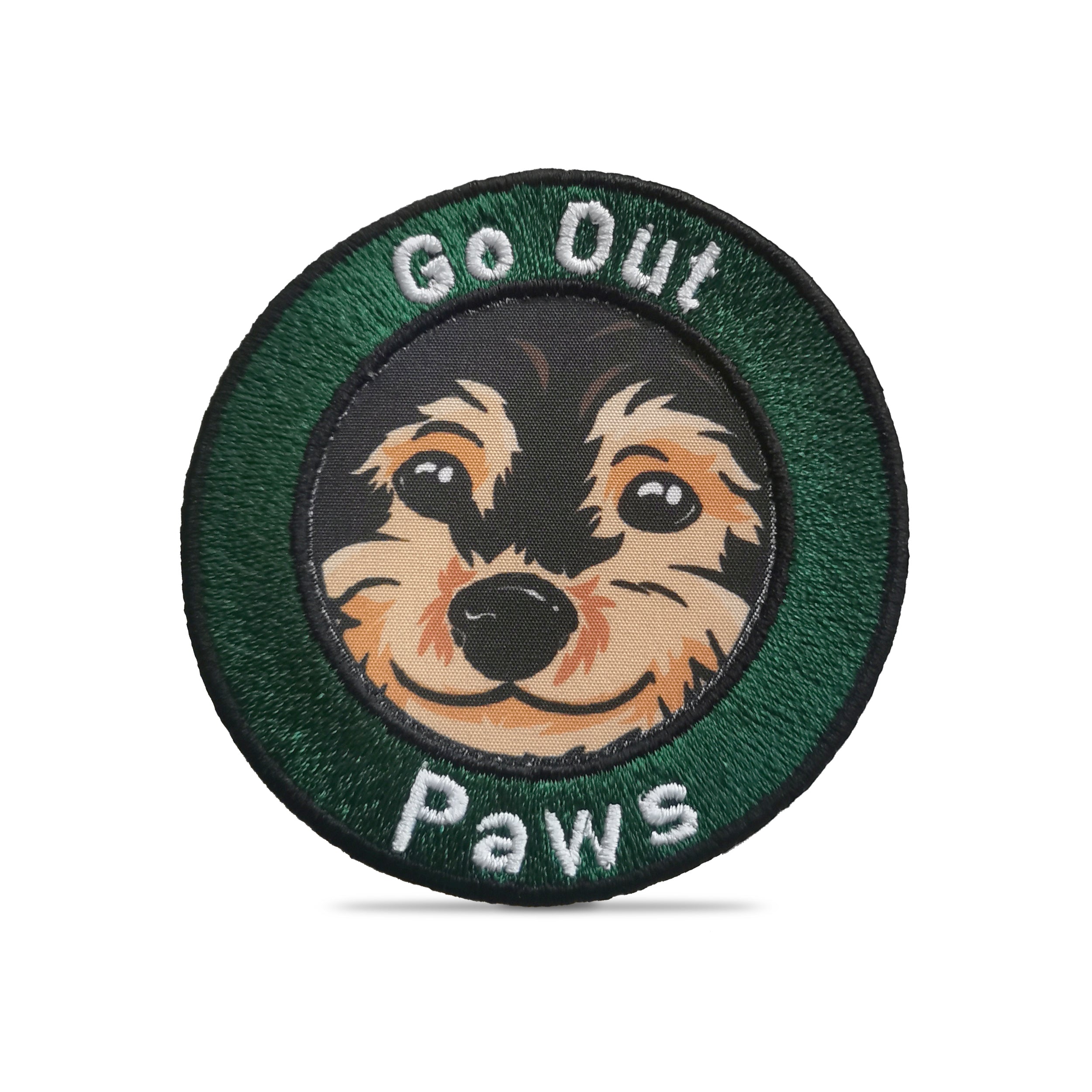 Embroidered circular patch with dog face and text 'Go Out Paws', perfect for bags and jackets.