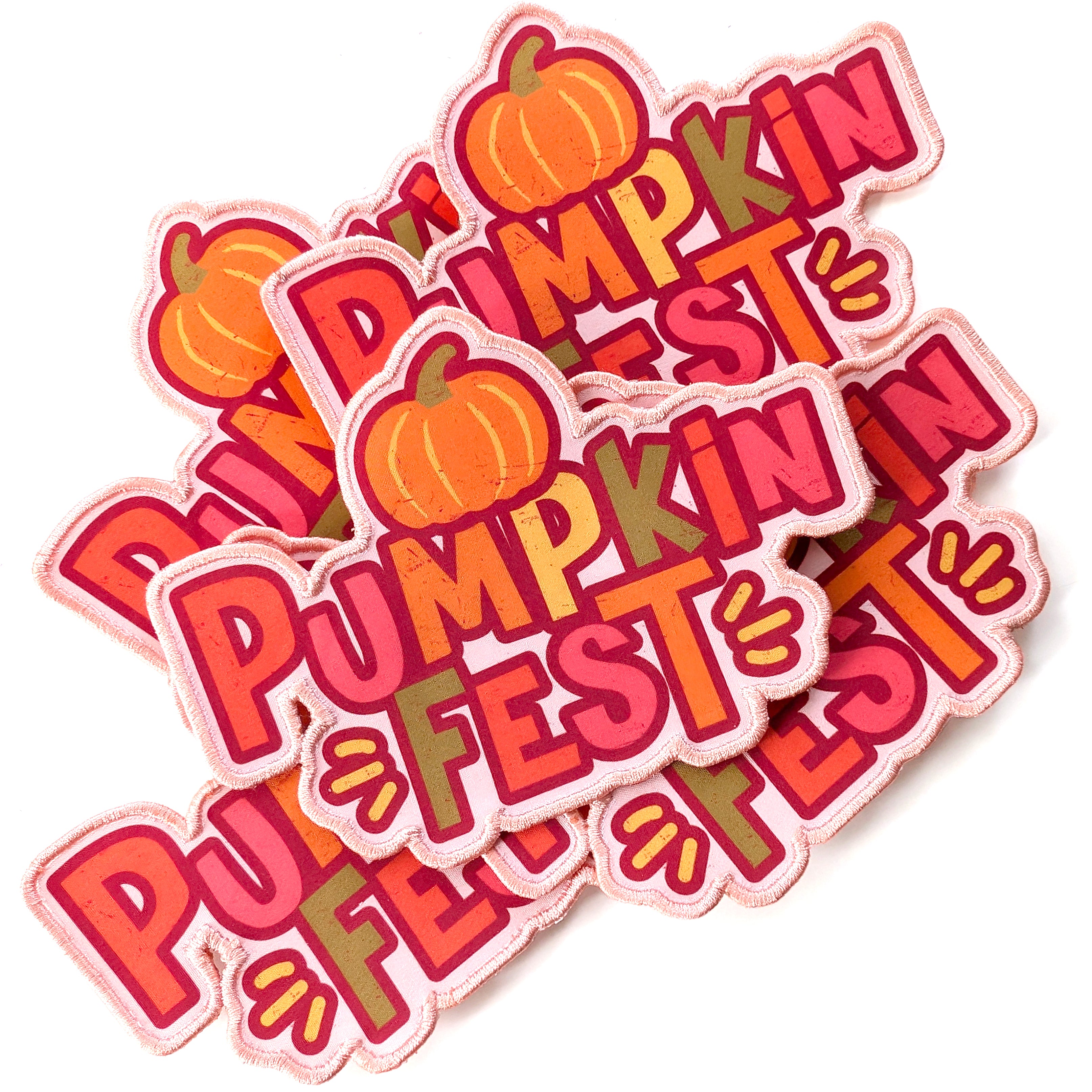 Colorful embroidered patches featuring the text 'Pumpkin Fest' and pumpkins, perfect for fall events and decorations.