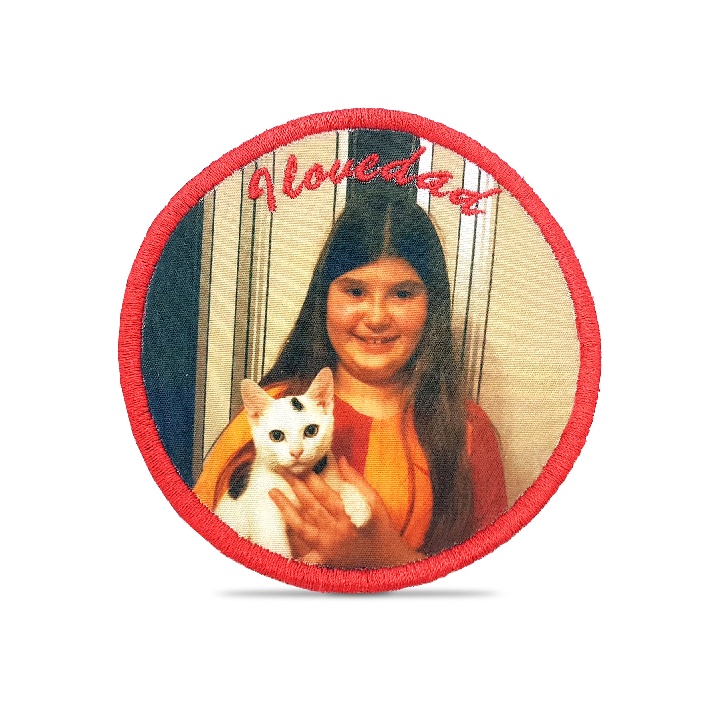 Custom embroidered patch featuring a printed photo of a girl holding a cat with vibrant colors and unique design.