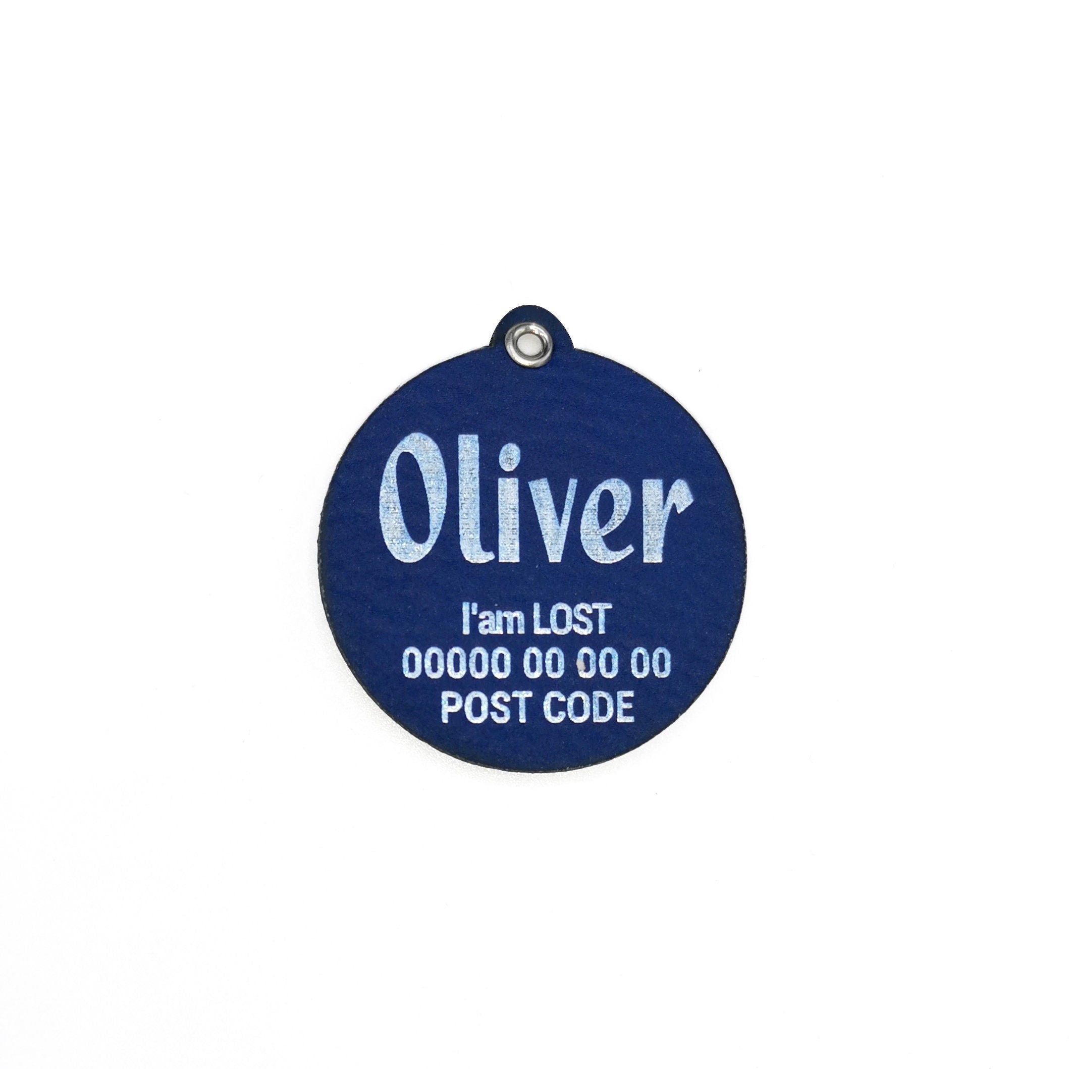 Custom double-sided blue leather dog name tag with laser engraving for pet identification, personalized with the name Oliver.