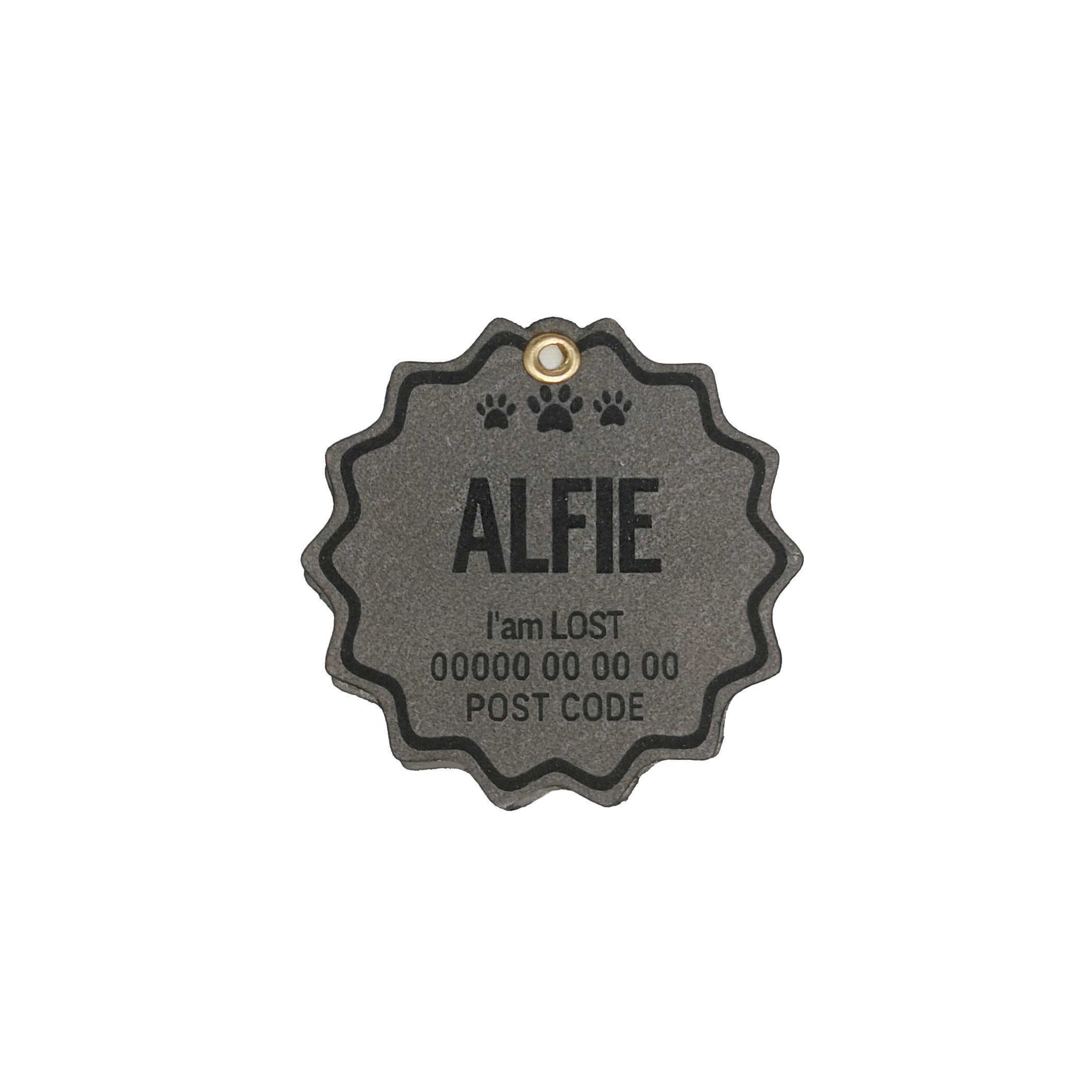 Custom leather dog name tag engraved with 'ALFIE', displaying lost info and a paw print design.