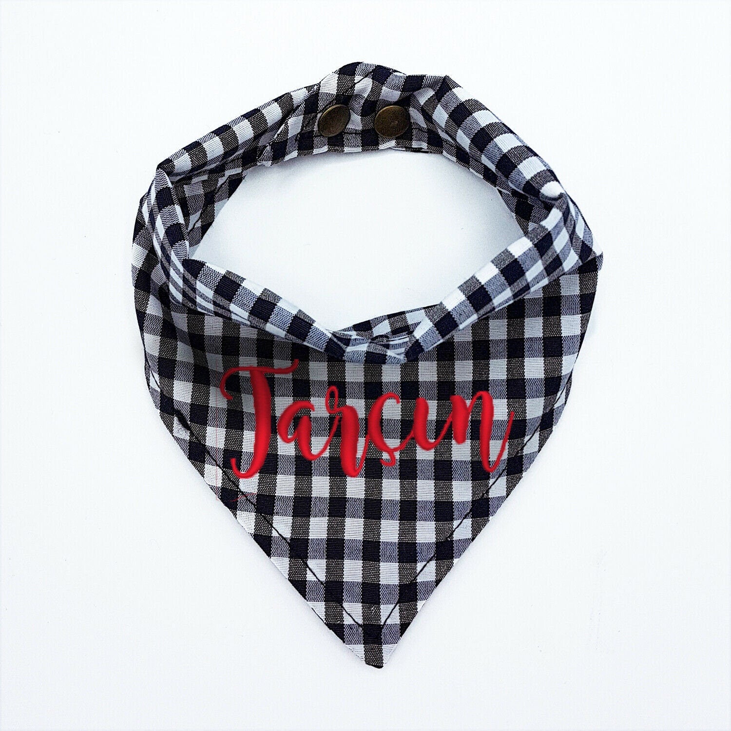 Personalised embroidered dog bandana in black and white check pattern with red name Tarçın.