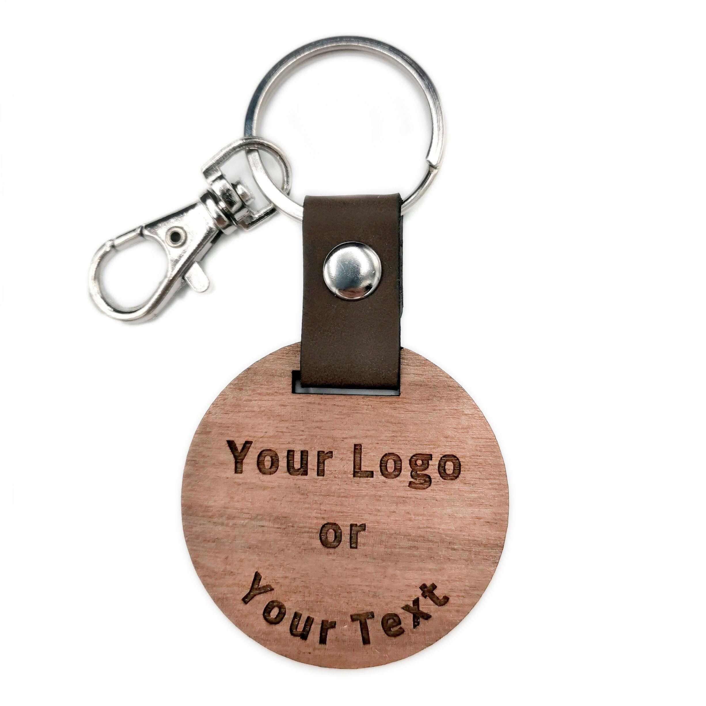Customizable wooden keychain with engraved text option and leather strap for personalized touches.
