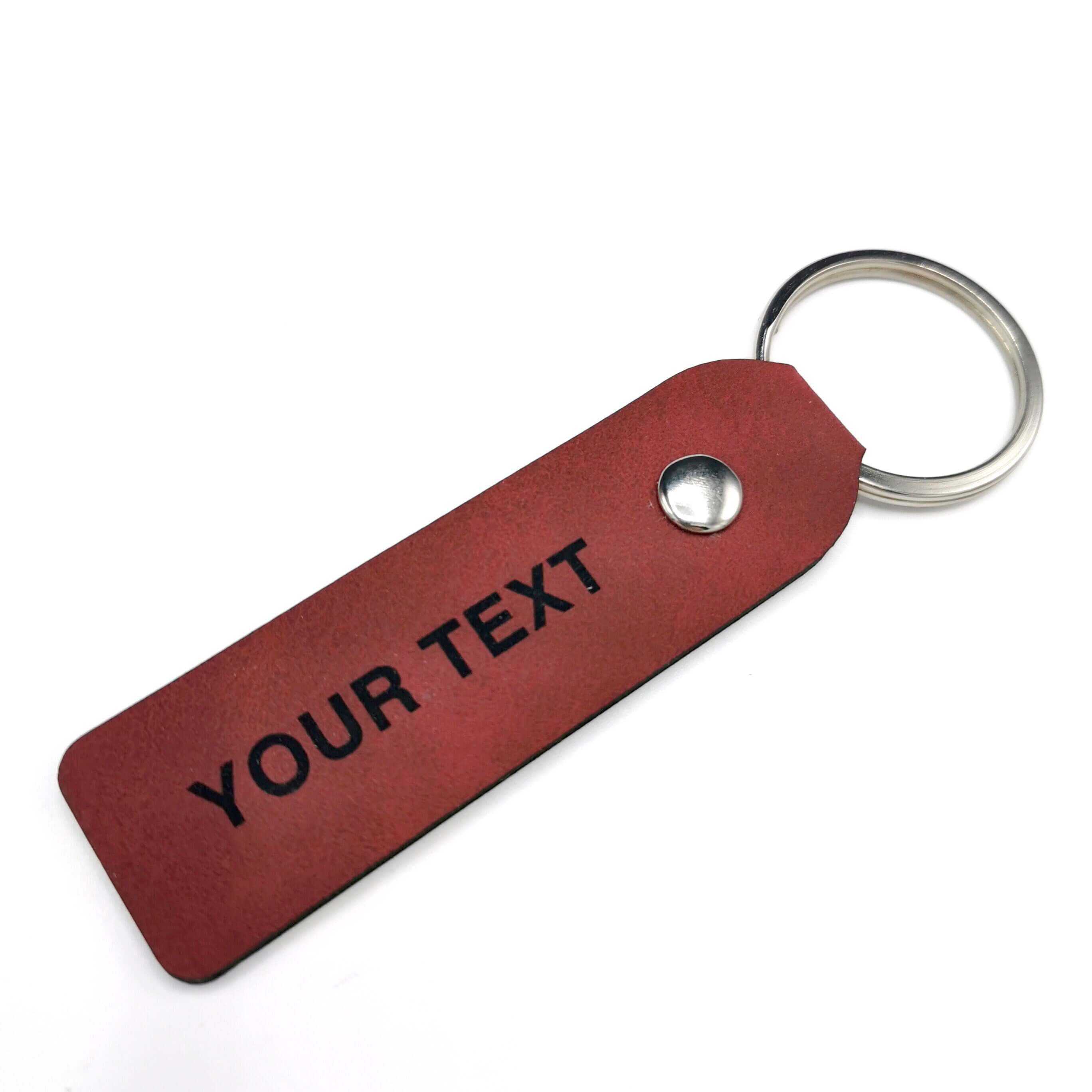 Custom leather keyring with personalized engraving, double-sided for gifts for him or her.