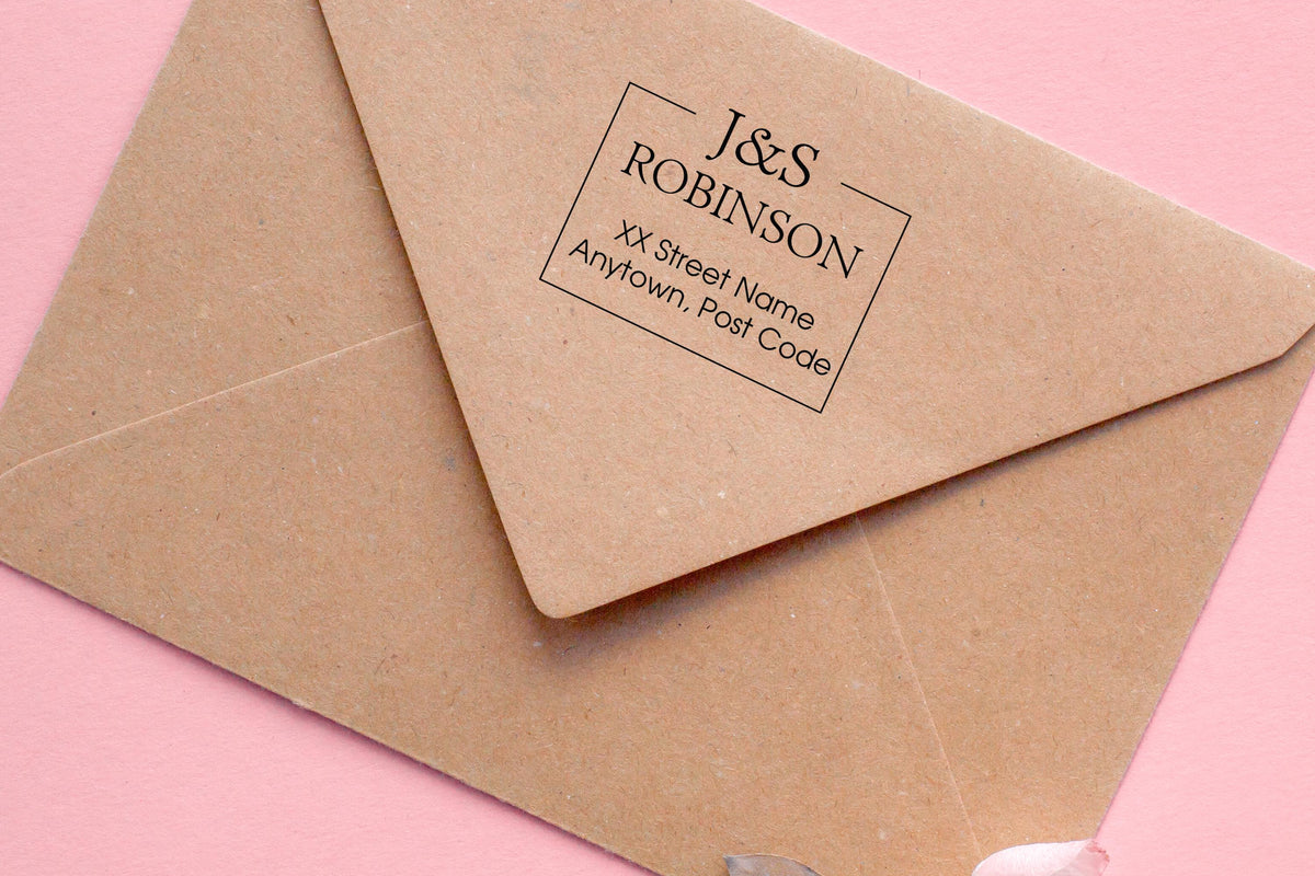 Custom address stamp on a kraft envelope, showcasing personalized return address for home or office use.