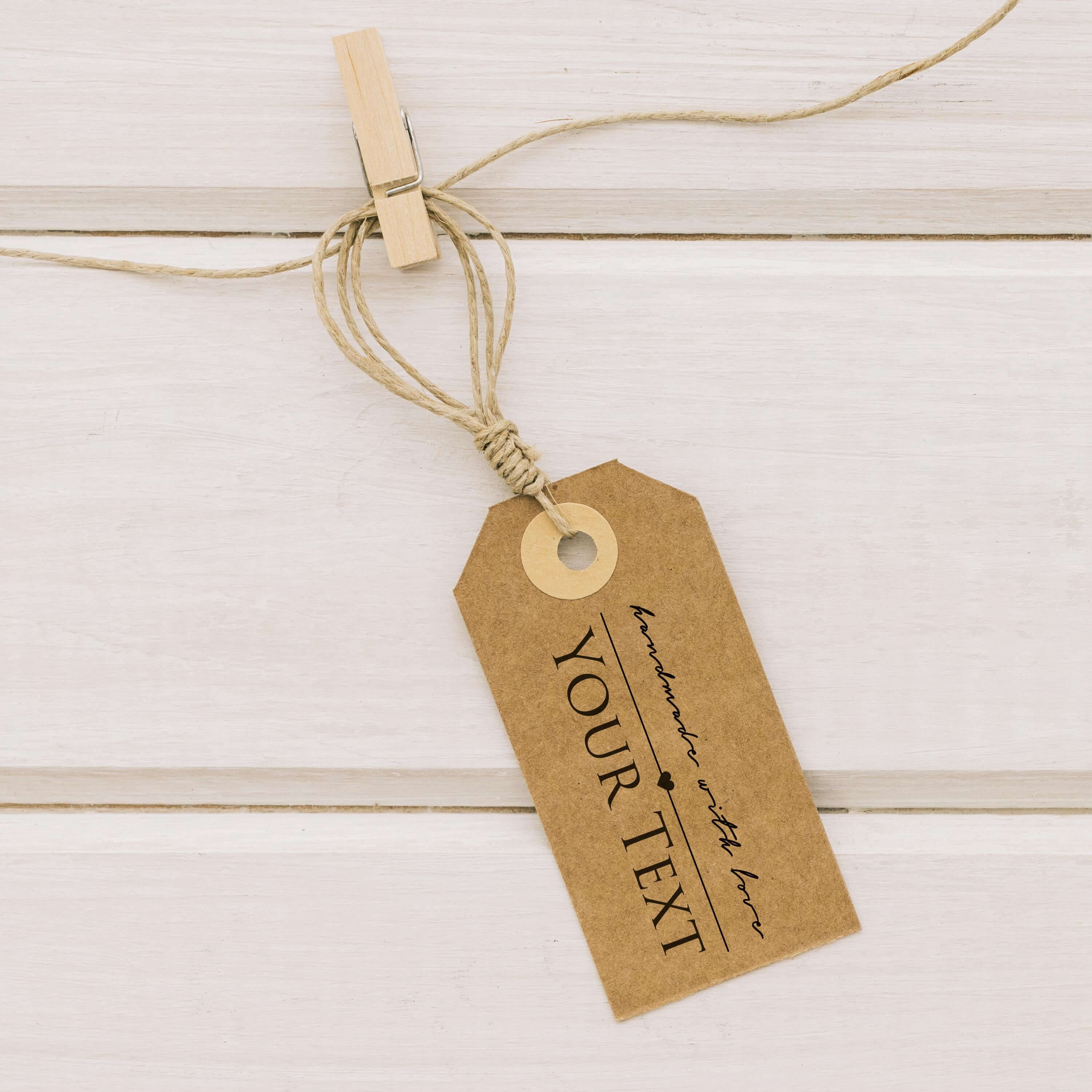Personalised handmade tag on a string with customizable text for unique DIY projects.