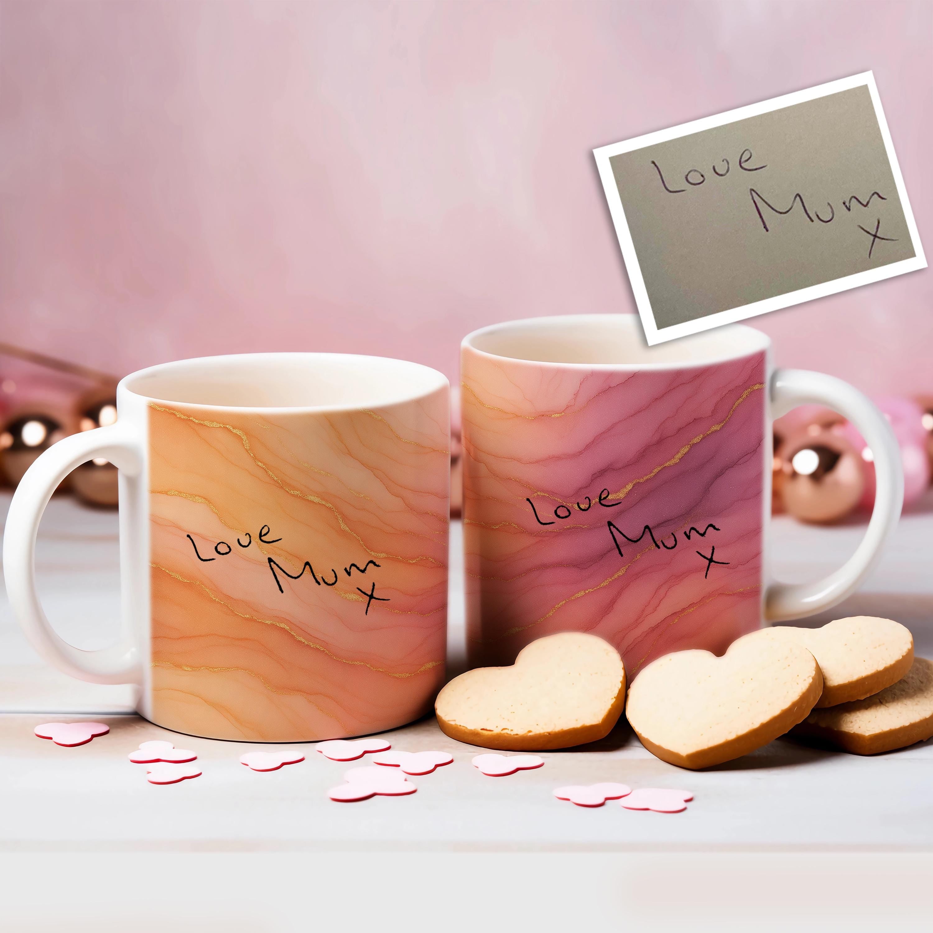 Custom handwriting mugs with marble pattern and 'Love Mum' message, surrounded by heart-shaped cookies.
