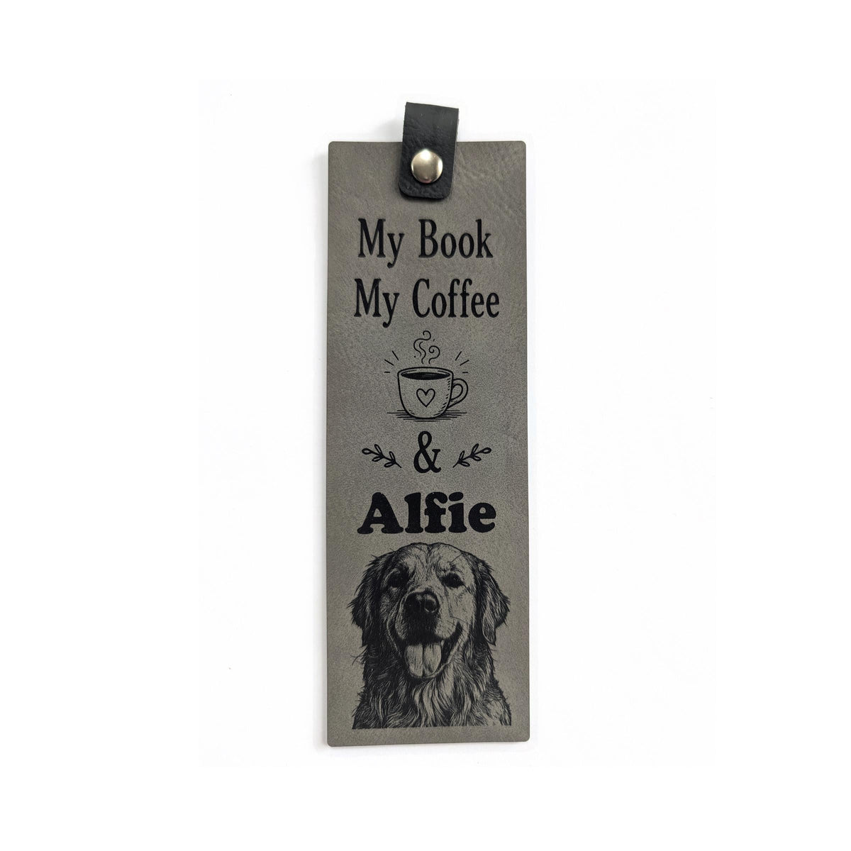Grey vegan leather bookmark engraved with a coffee cup, a pet name and a golden retriever portrait, with a black tab