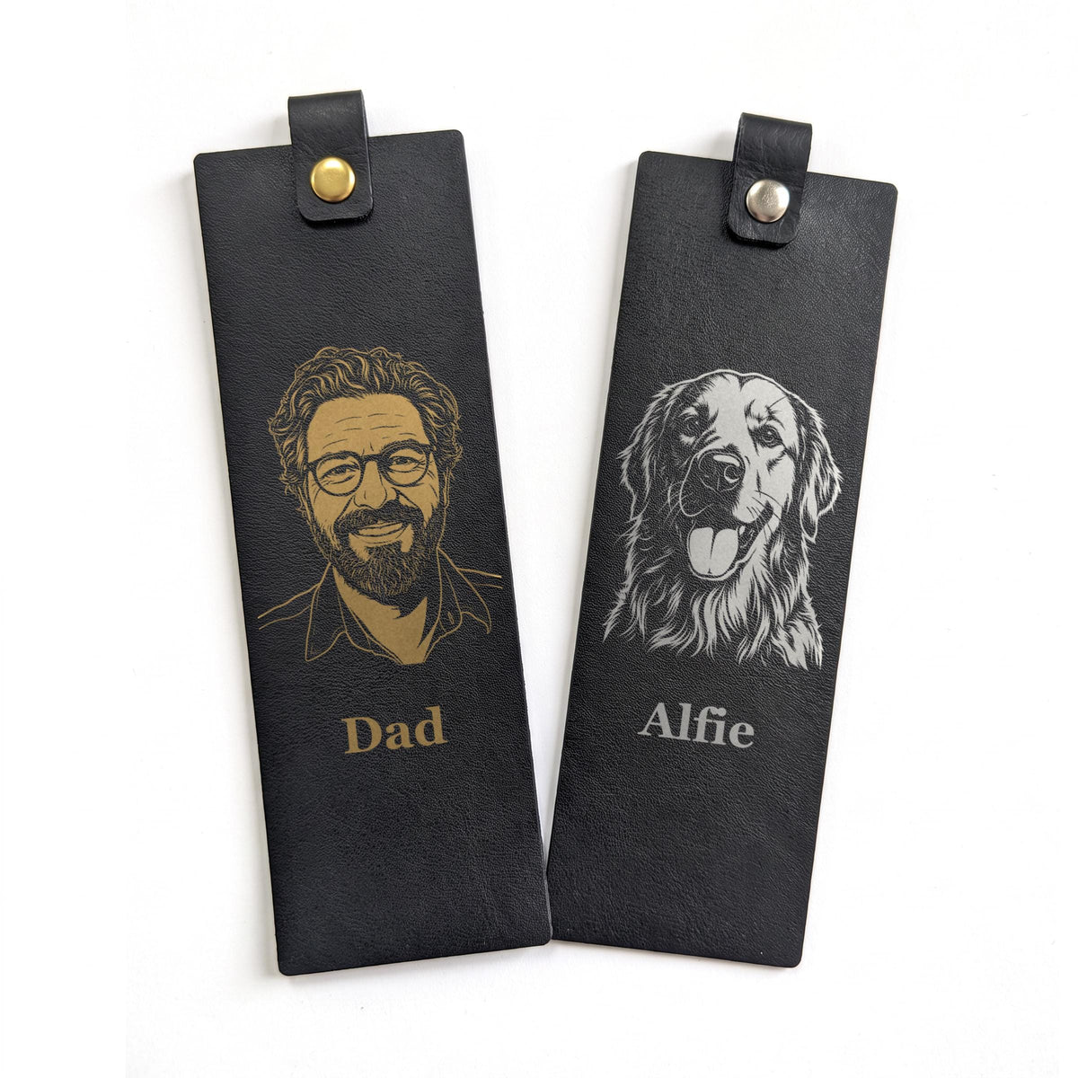 Black/Gold and Black/Silver vegan leather bookmarks engraved with a portrait and a dog, the engraving revealed in gold and silver