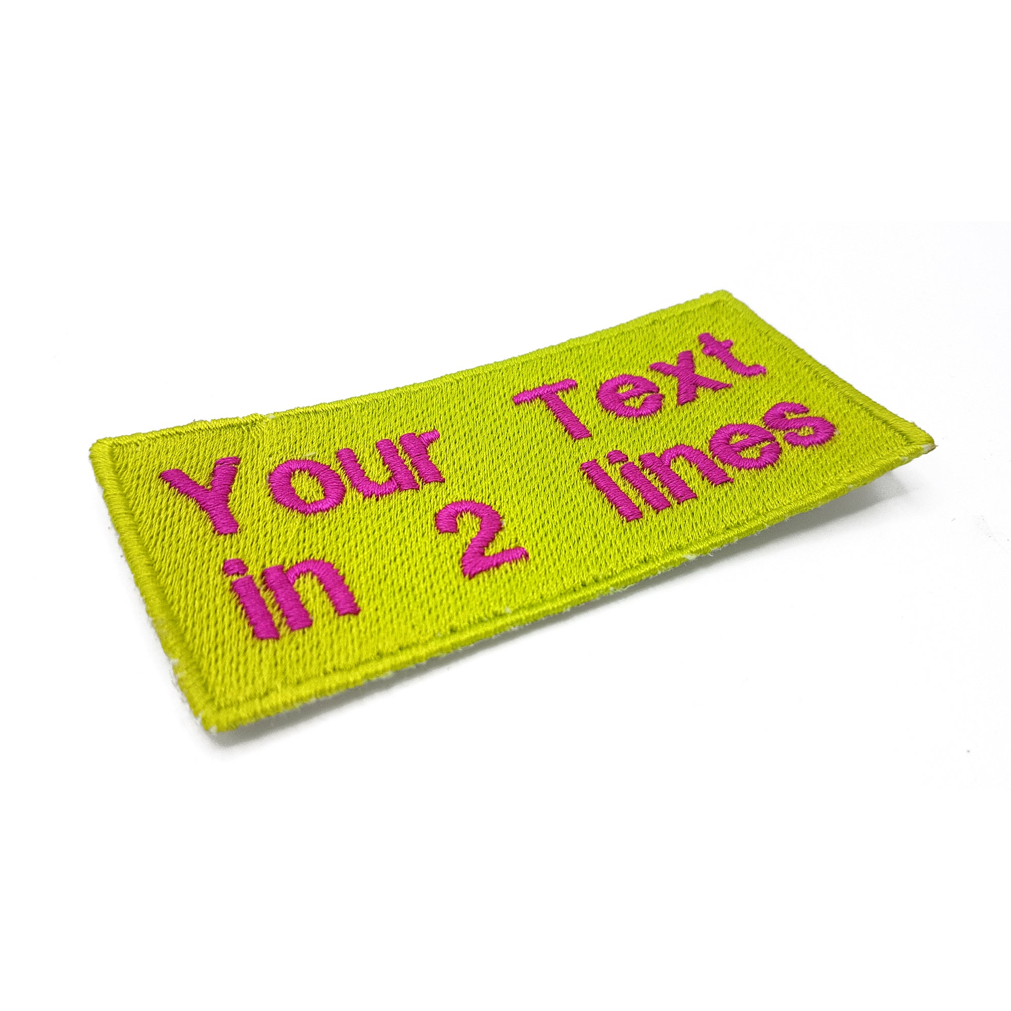 Personalized embroidered patch showcasing custom text in two lines on a bright yellow background.