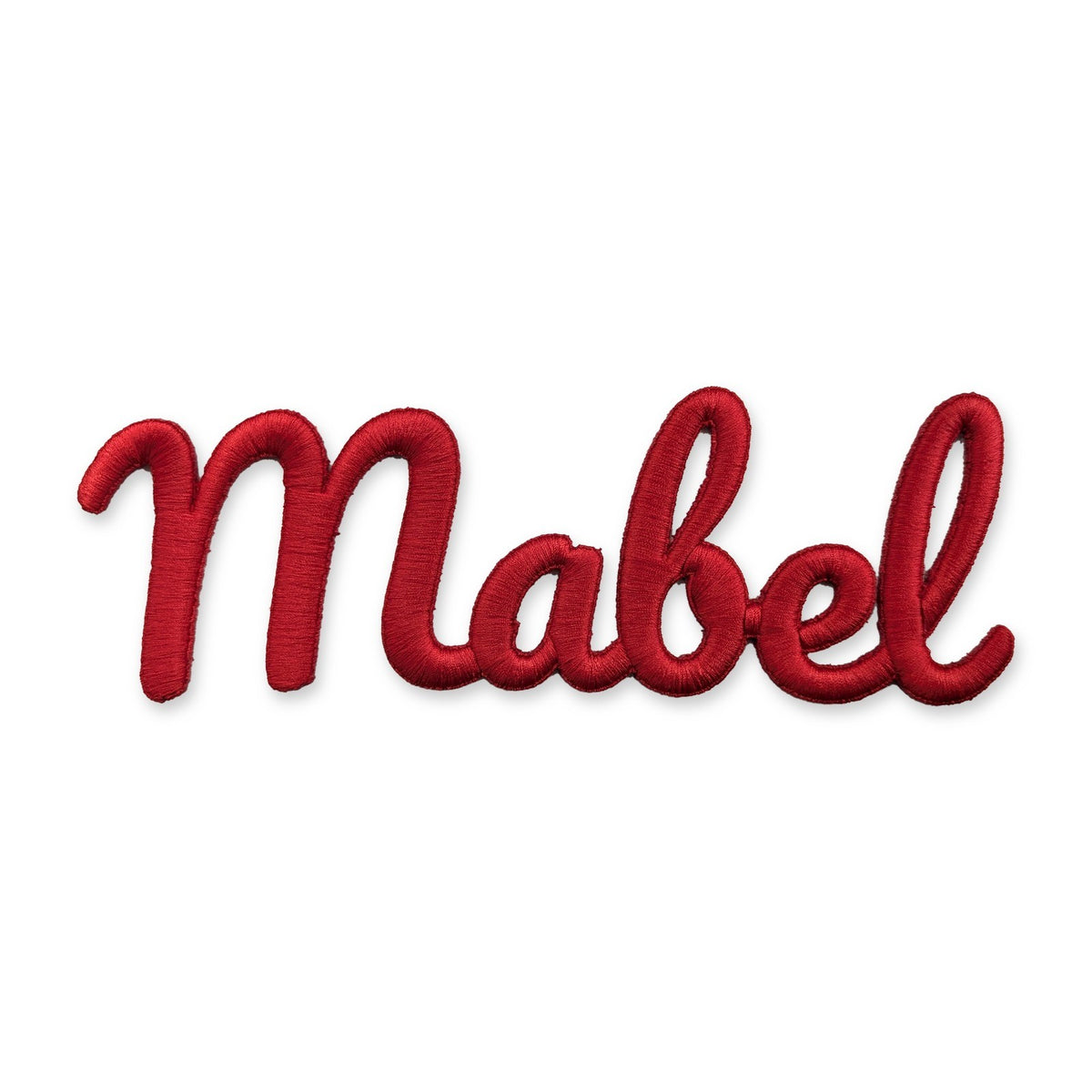Red 3D raised embroidered name patch reading Mabel, cut to the letter outline, on a white background
