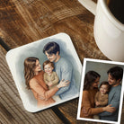 a family portrait of a man, woman, and child, along with a separate photograph of the same family. coaster