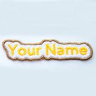 Personalised embroidered custom patch with yellow text "Your Name" on a white background.