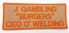 Personalized embroidered patch featuring the name 'J Gambling', text 'Burgers' and 'CEO O' Welding' in vibrant orange thread.
