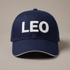 French navy custom baseball cap with the name LEO in white 3D puff embroidery